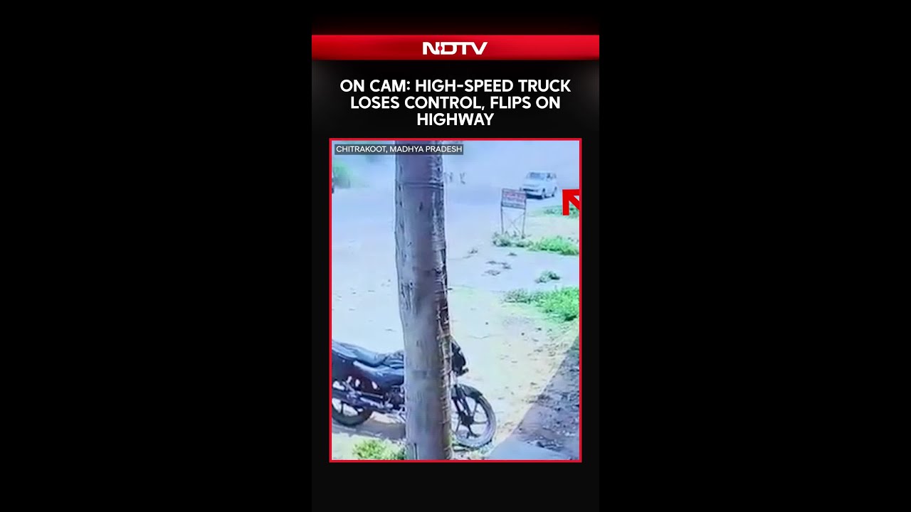 Madhya Pradesh News | Chitrakoot Horror: Speeding Truck Flips Dramatically, Bolero Narrowly Escapes