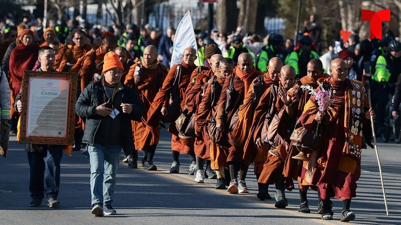 Buddhist monks visit the Peace Monument near the U.S. Capitol