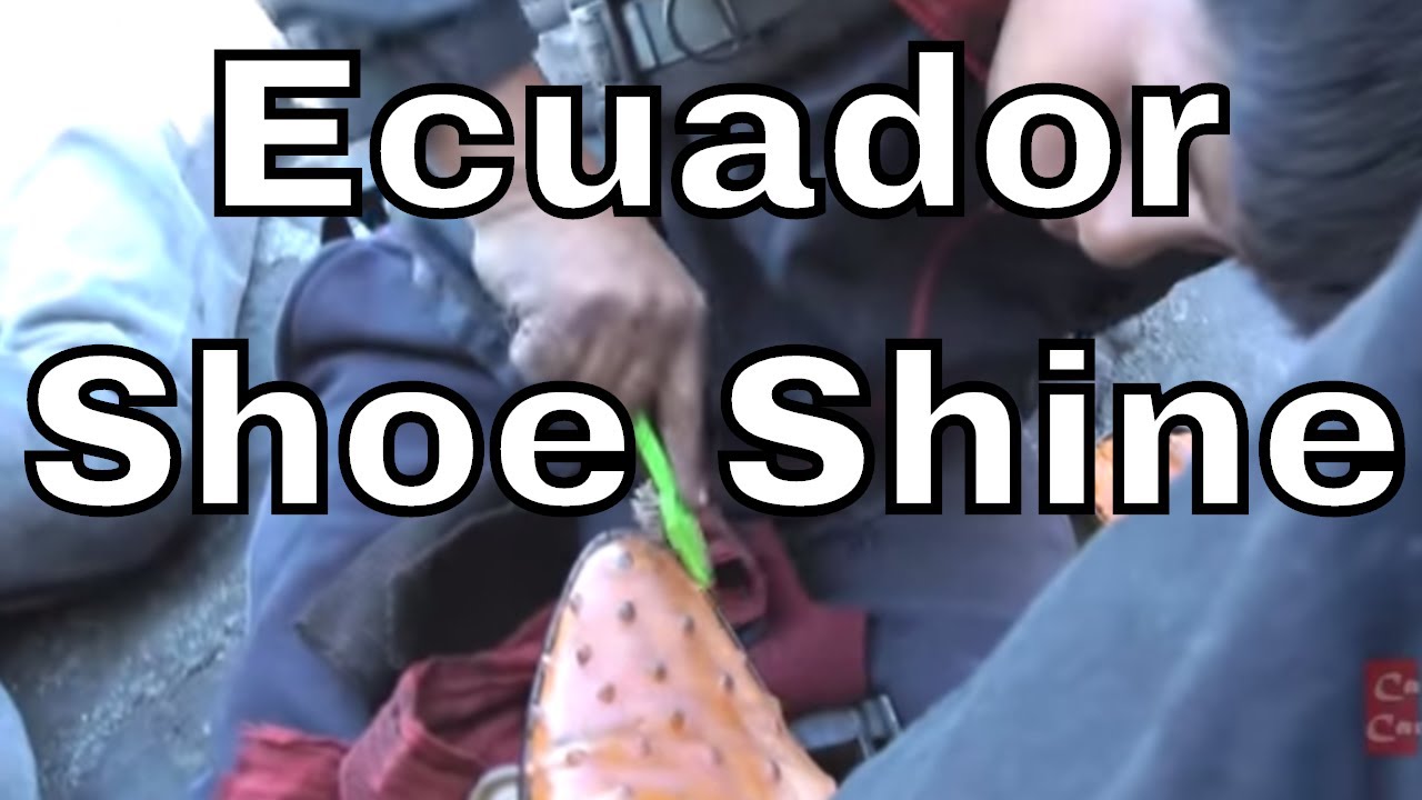 Boy Shining my cowboy boots in Quito, Ecuador