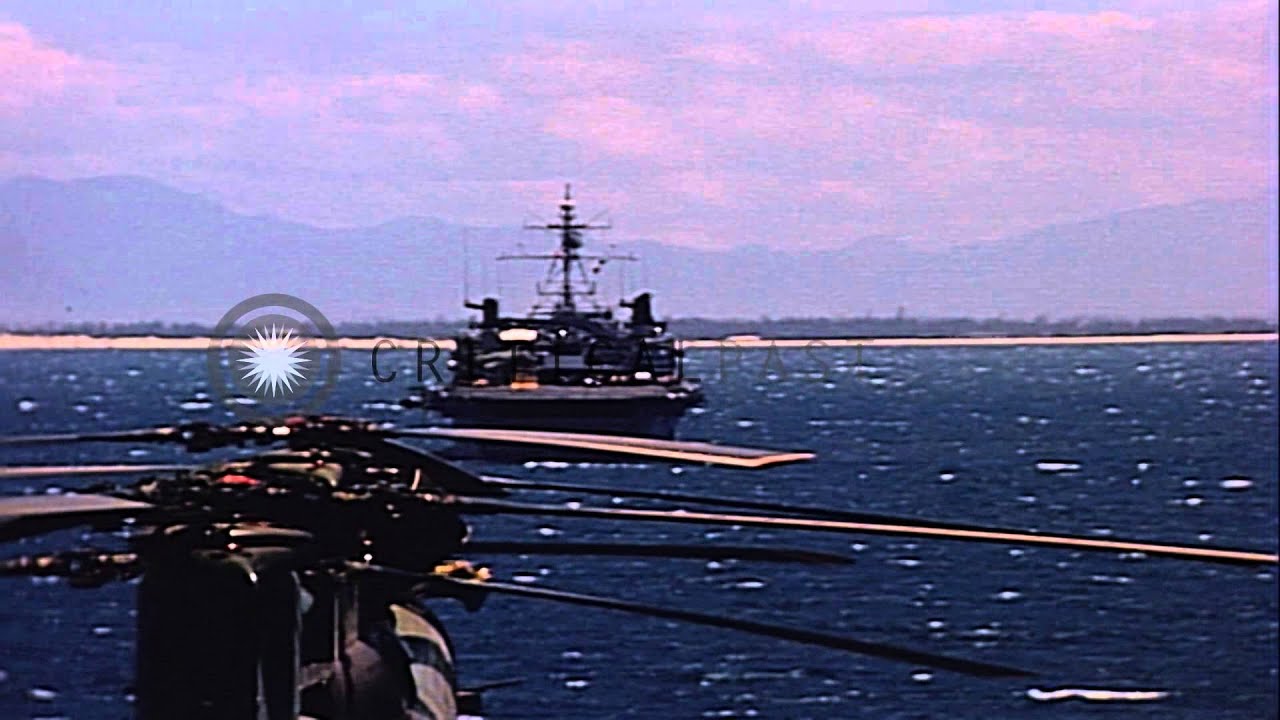 A UH-2A Seasprite helicopter lands on the flight deck of the USS Princeton underw...HD Stock Footage