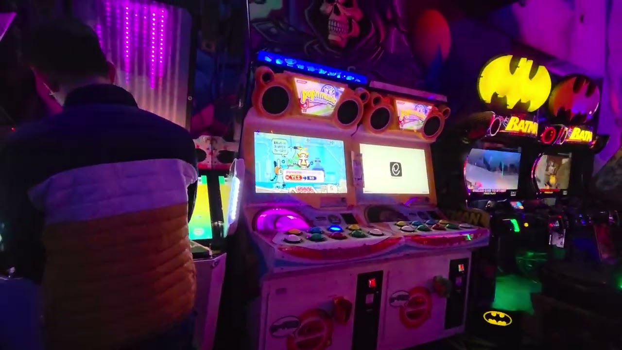 Looked around Arcade games and played Pop n Music arcade game at Arcade Monsters place.
