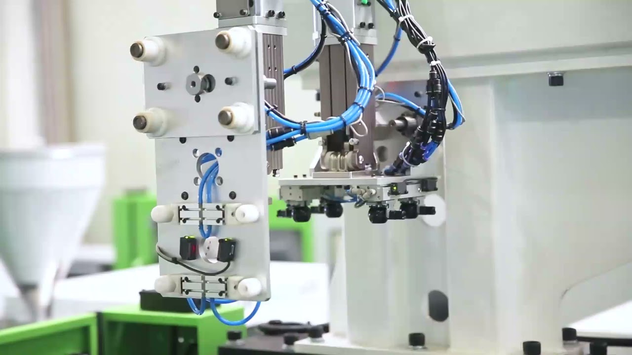 Automation solution of injection molding UPVC ball valve