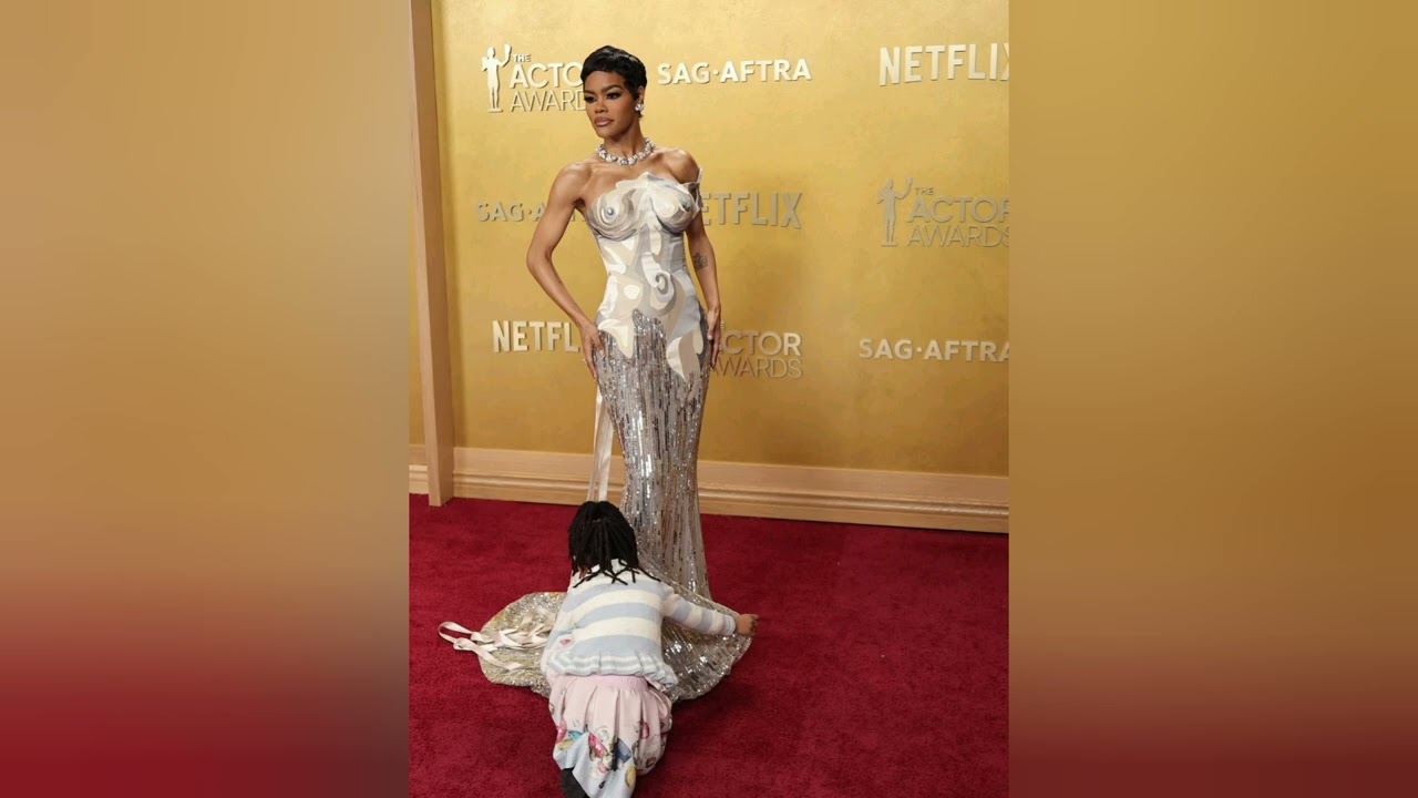 Teyana Taylor's daughter Rue Rose helps her fix her dress at The Actor Awards
