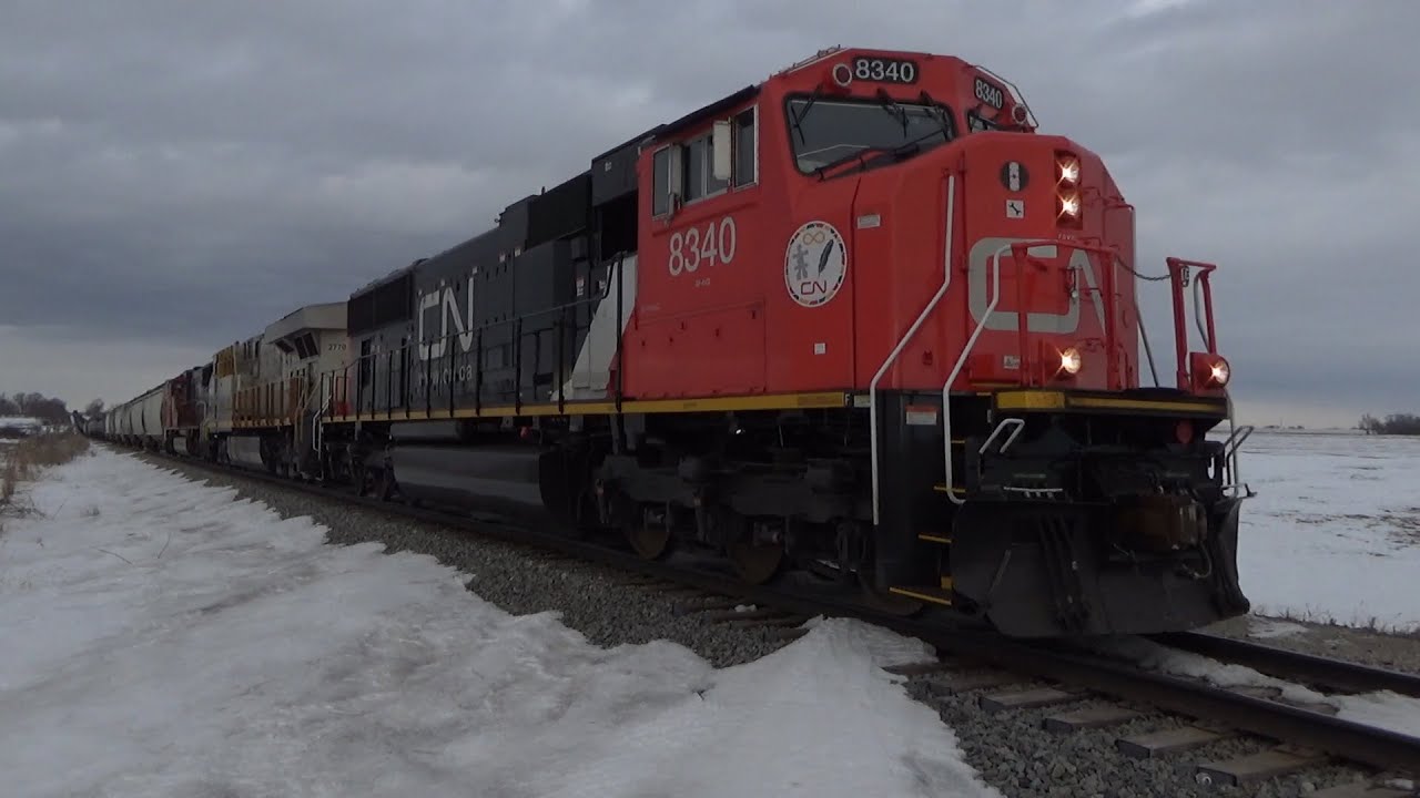 CN 8340 leads CN M338 Eastbound just west of Jesup, IA