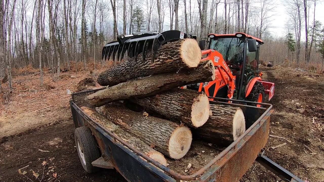 #356 Kubota LX2610 compact tractor.  All Grapple. Grappling more logs for firewood in the forest.