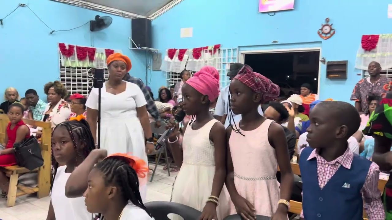 Overseer Morgan Daughter singing “Standing Outside the Portal”