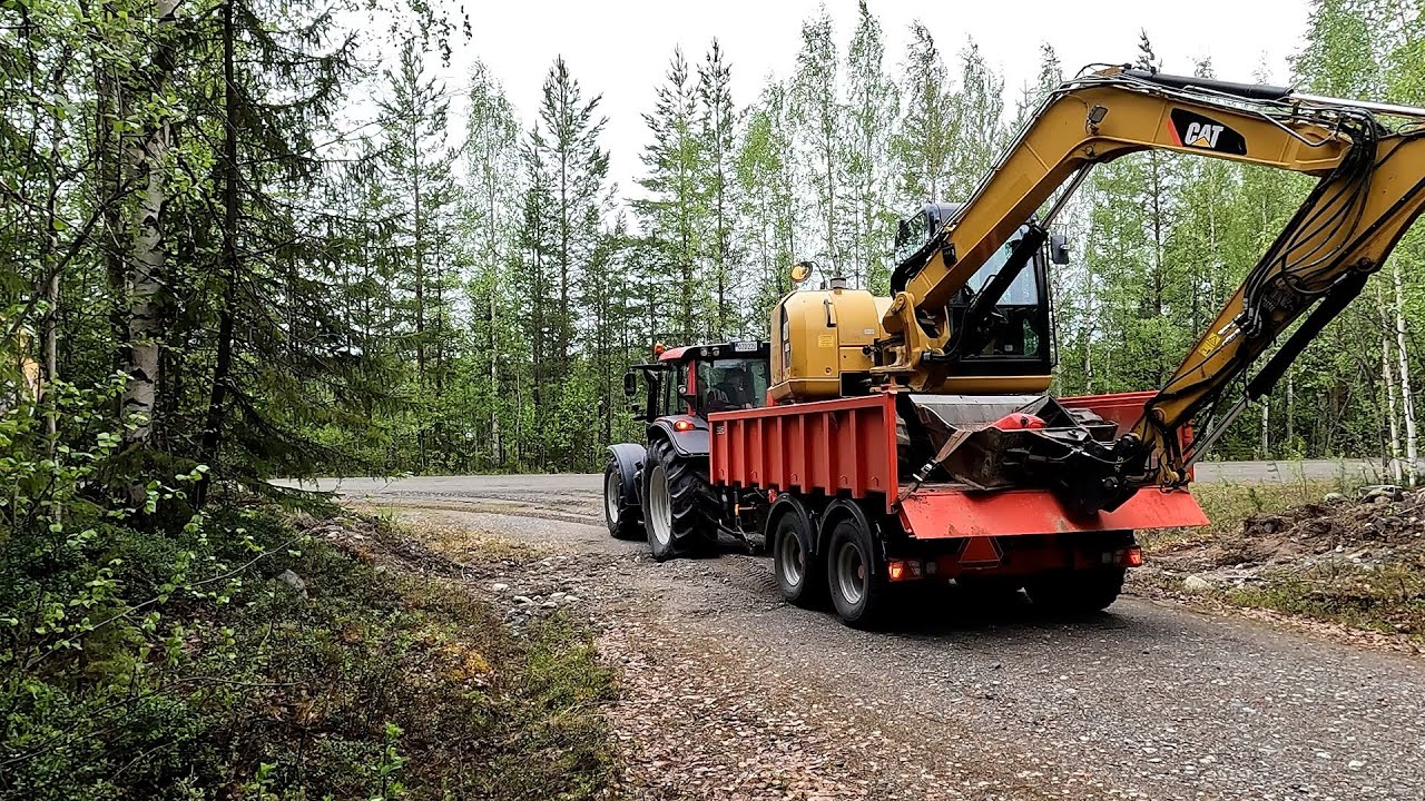 Relocating the CAT with the hooklifter