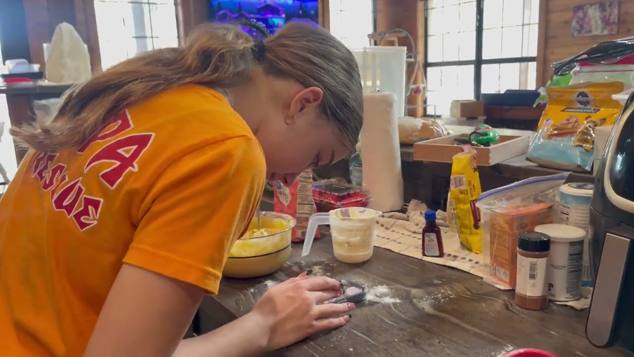 Emma Age 13 makes Strawberry Banana Muffins