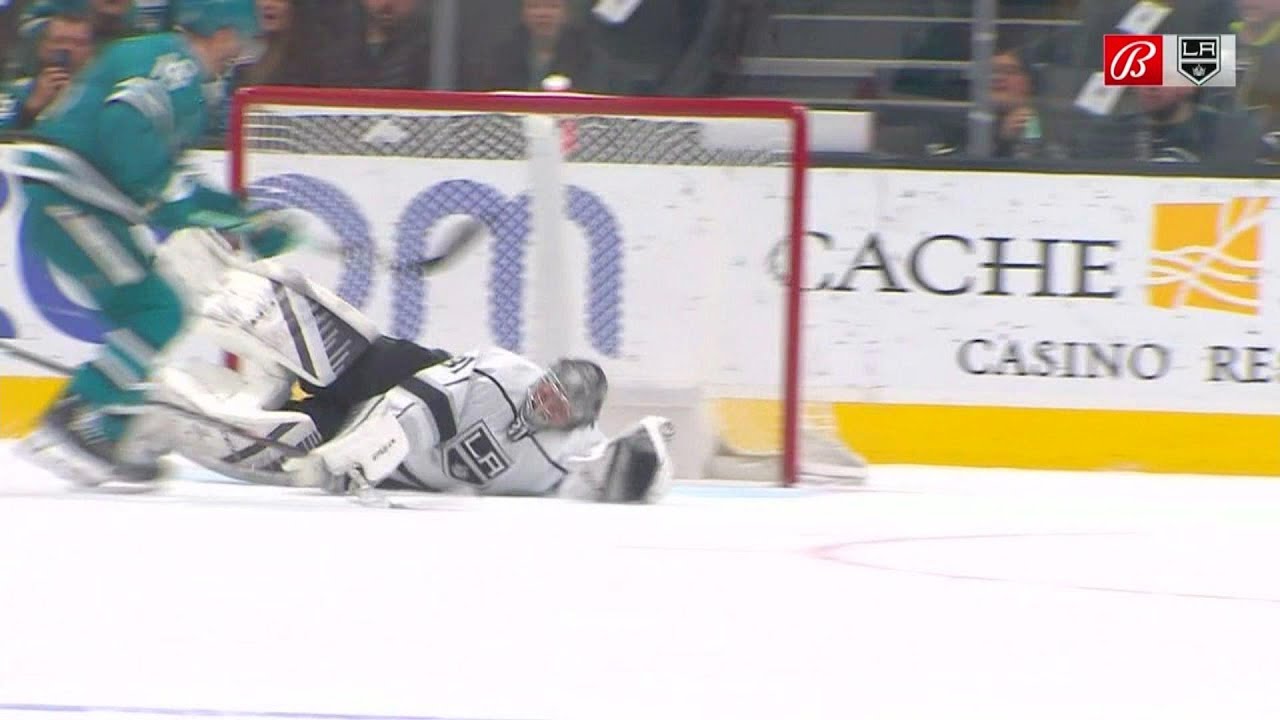 David Rittich makes a sprawling save on Filip Zadina.