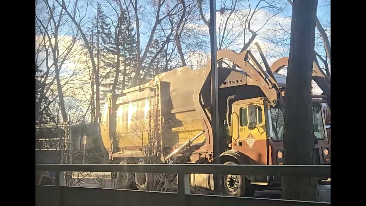 Miller Waste truck emptying garbage bins on a Thursday morning