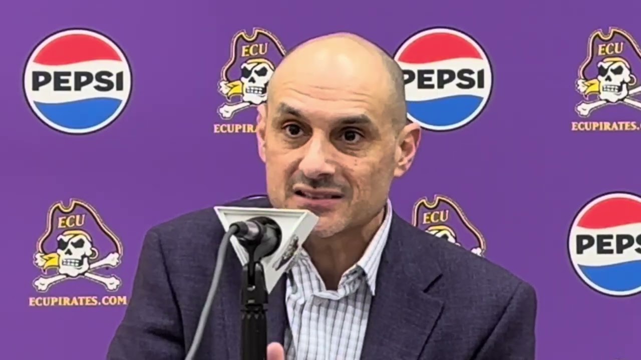 ECU Basketball’s Jordan Riley and Mike Schwartz after a home win against Memphis