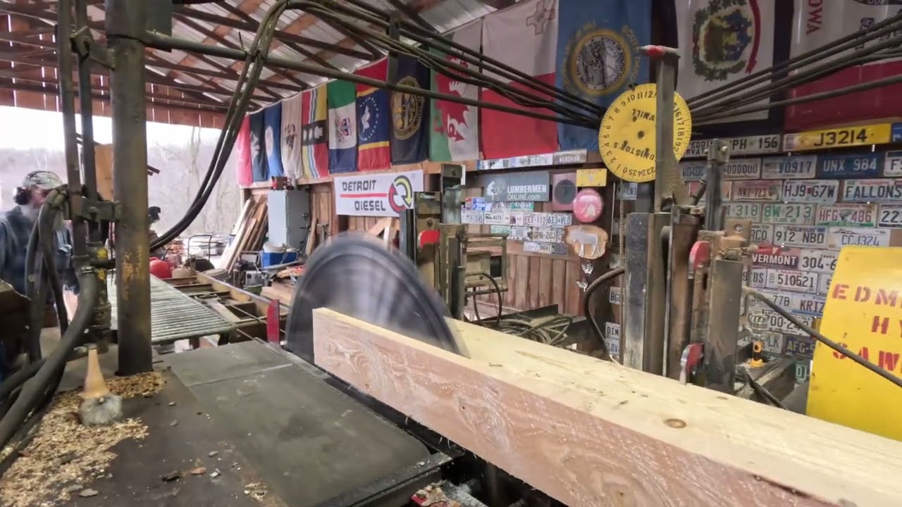 sawing two 16' spruce logs into 2x4s large snack video # 526