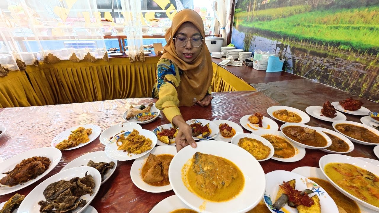Table full of Masakan Padang dishes - You Won't Believe This Spread!