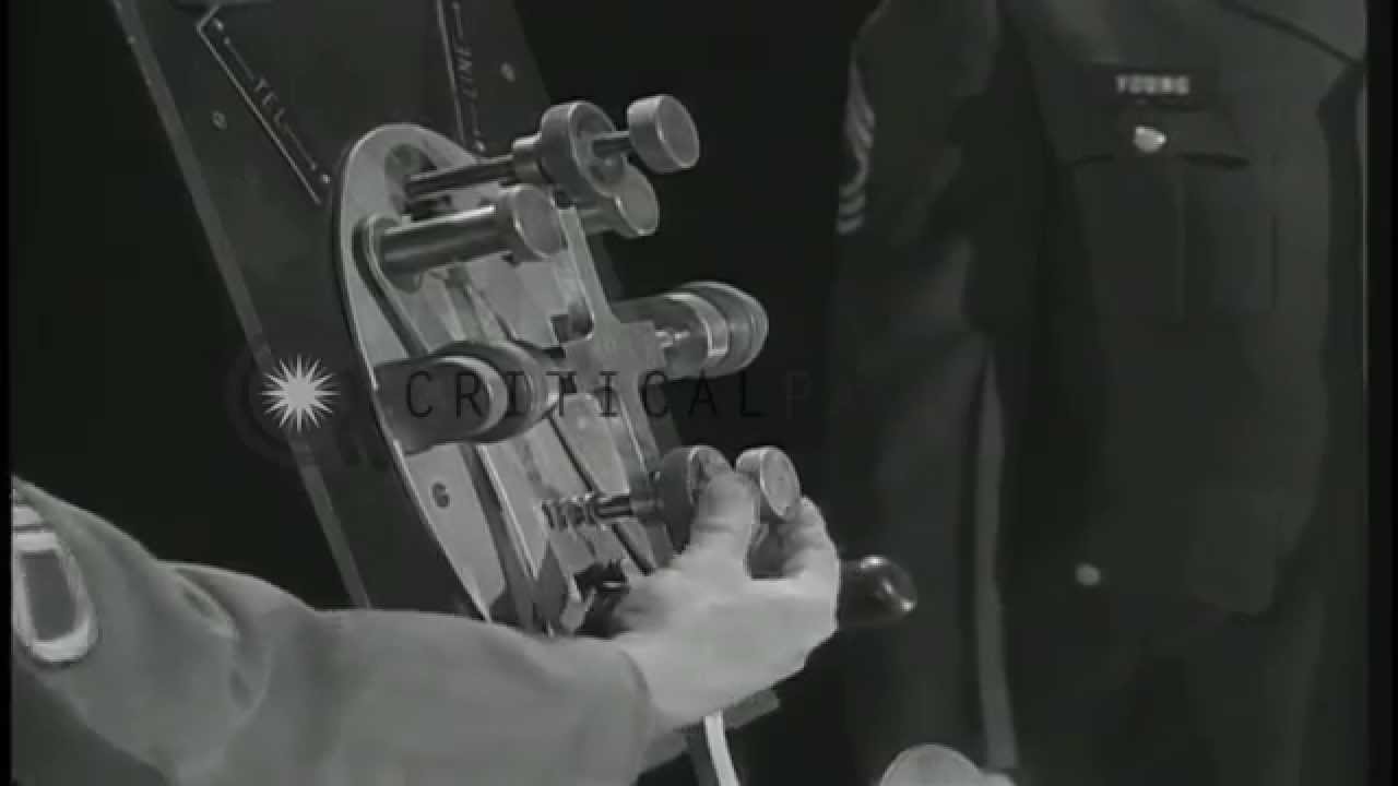 Officer Young demonstrates the use of J-38 Hand key. HD Stock Footage