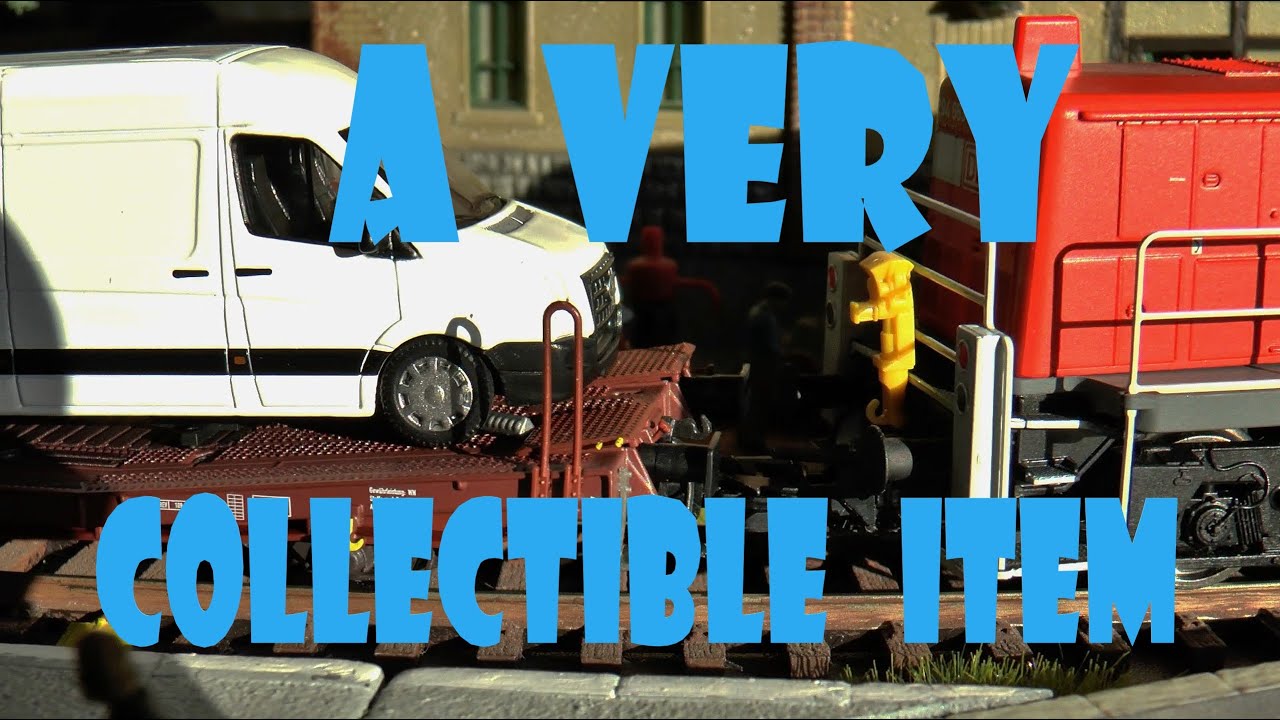 TRIX 24428 with 4 Wolksvagen Crafter vans and 2 metal body Type Laads 800B Flat Cars