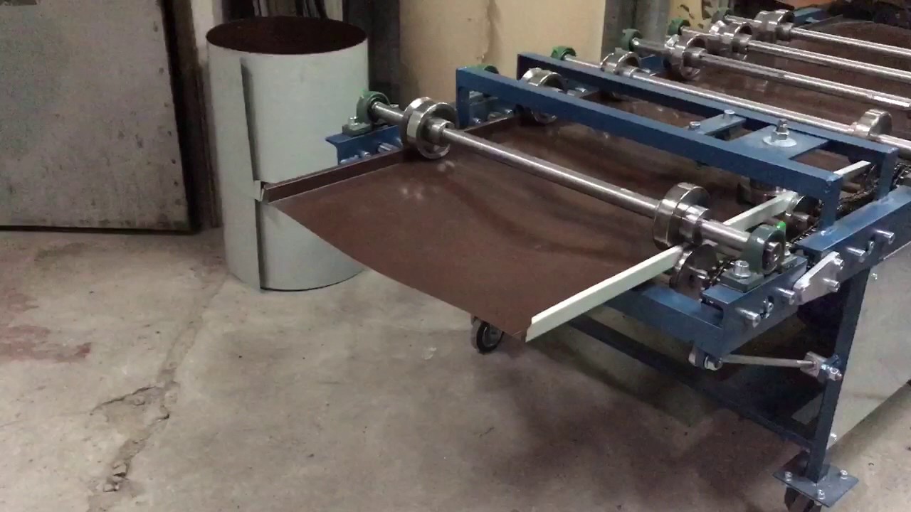 Profiling machine FM for double standing seam panels. Forming of the double standing seam panel.