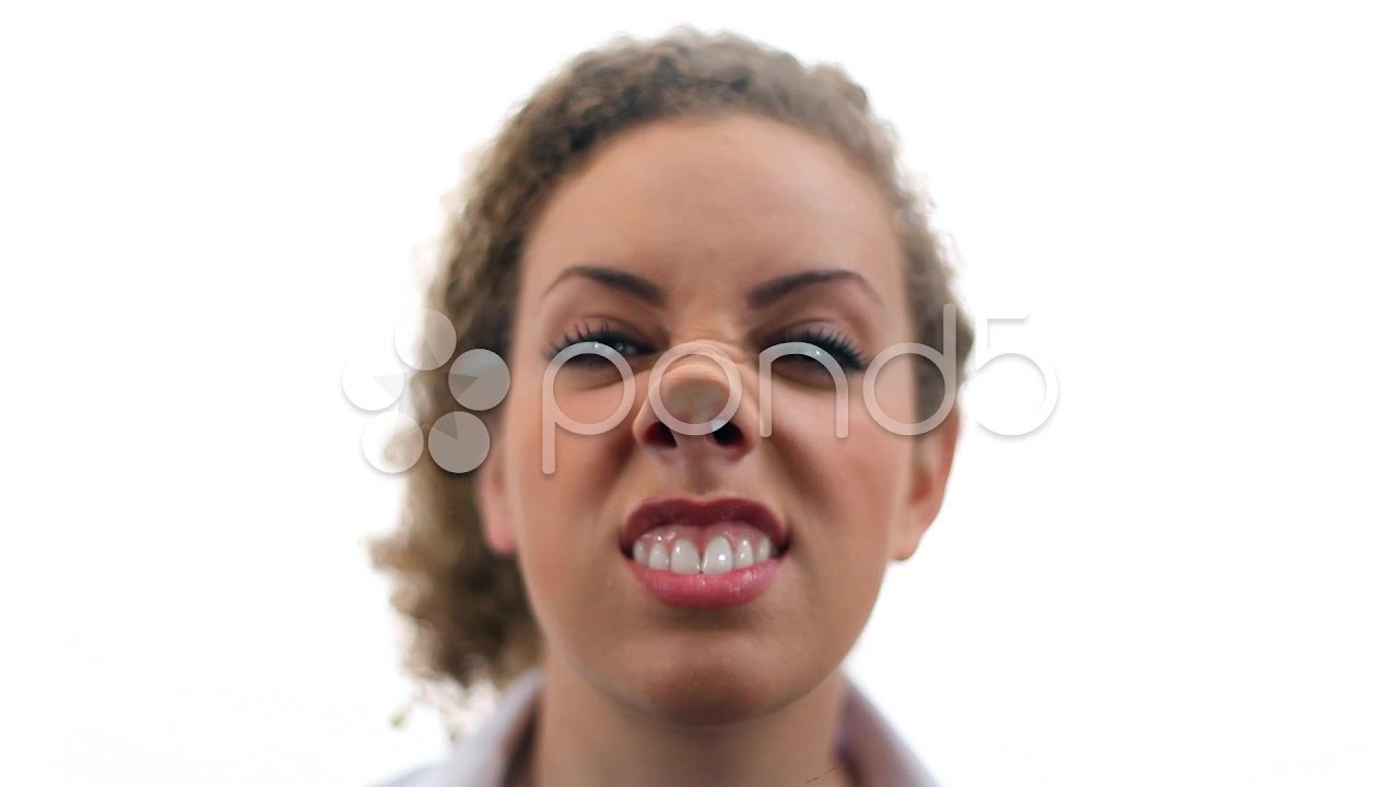 Funny woman making faces on glass. High quality HD video footage. Stock Footage