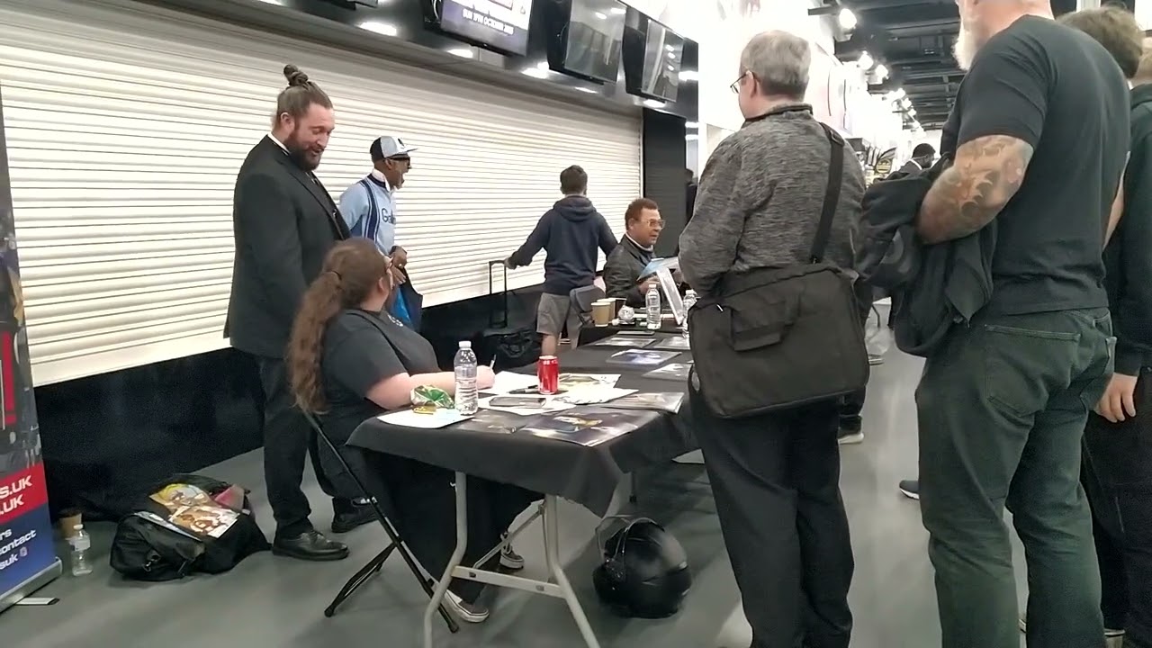 Danny John-Jules with John Barrowman and Craig Charles for fans at autograph signing table, 13-10-25