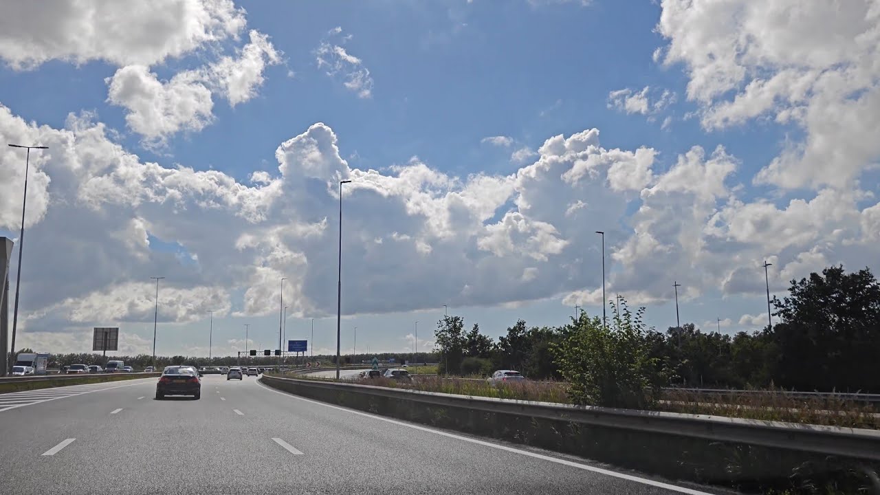 Driving in The Netherlands. Sunday Serenity: A Relaxing Drive Amsterdam highway. No talking