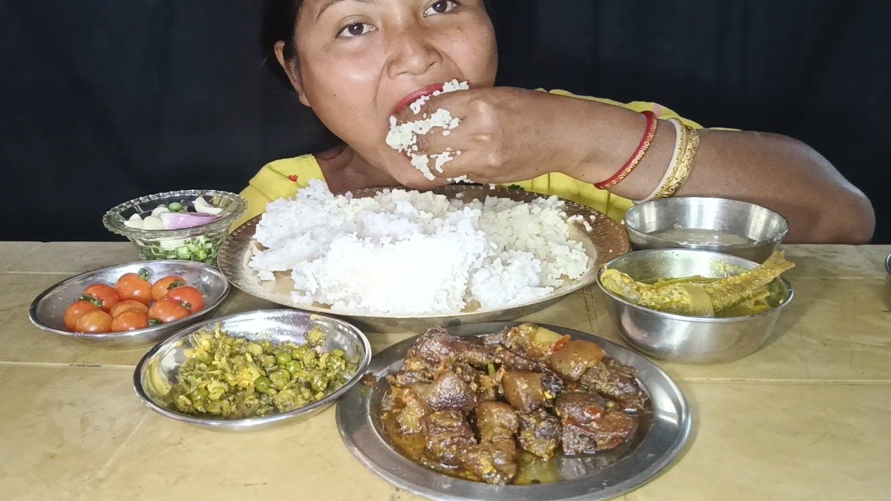 White rice // bamboo shoots with fish curry // pork dry fry // karela matar mix bhaji 
