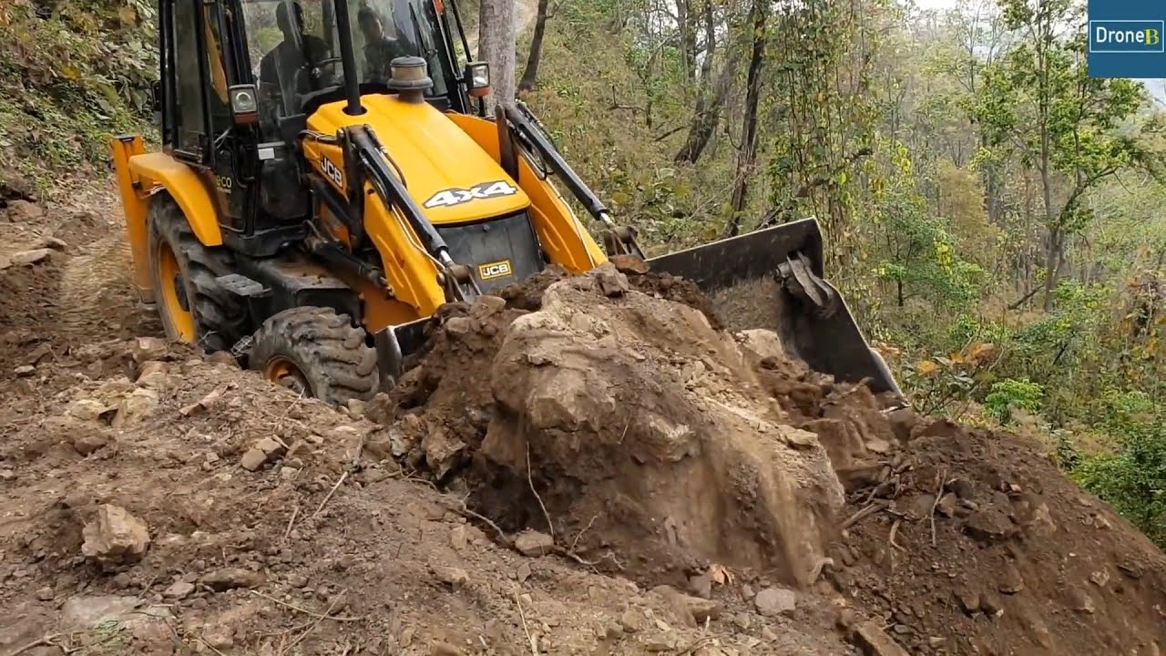 Step by Step Cutting and Leveling Pile of Dirt on Mountain RoadSide