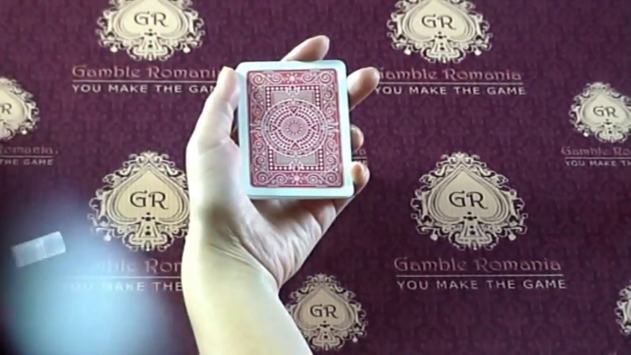 Marked cards with invisible ink for cheating at poker games