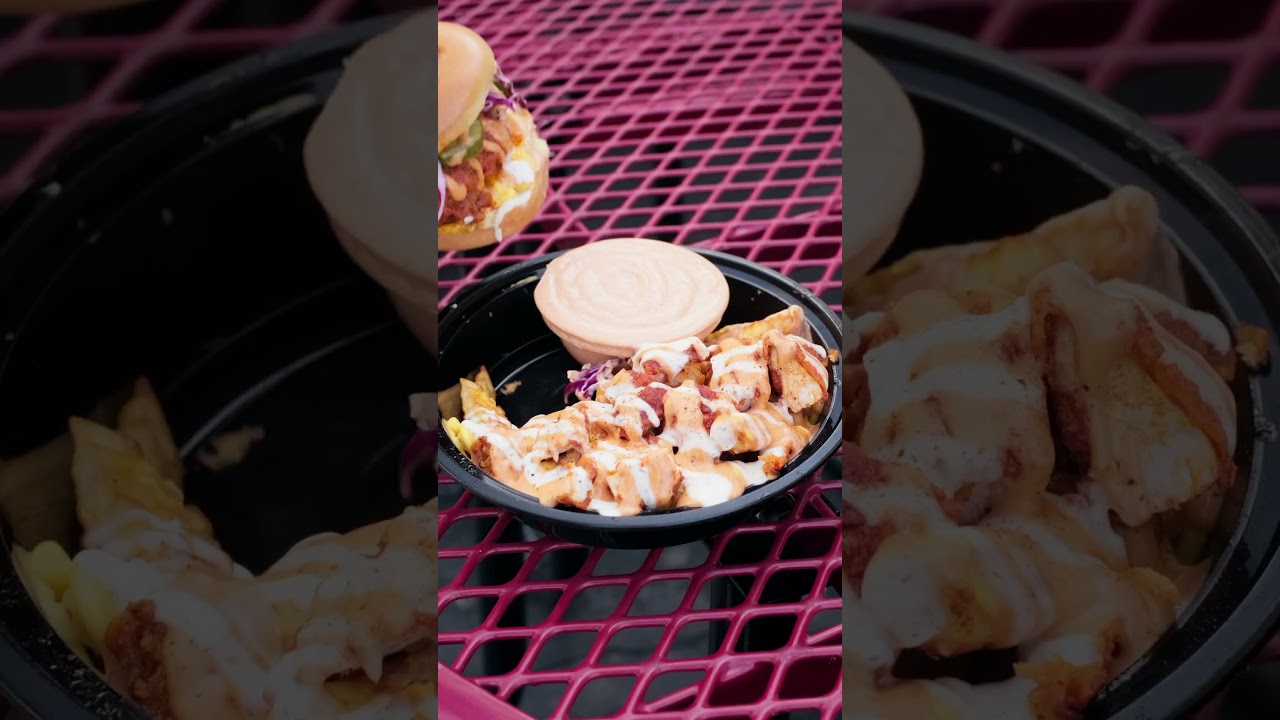Indulge in the ultimate comfort food! Red Rooster Hot Chicken&rsquo;s loaded fries are packed