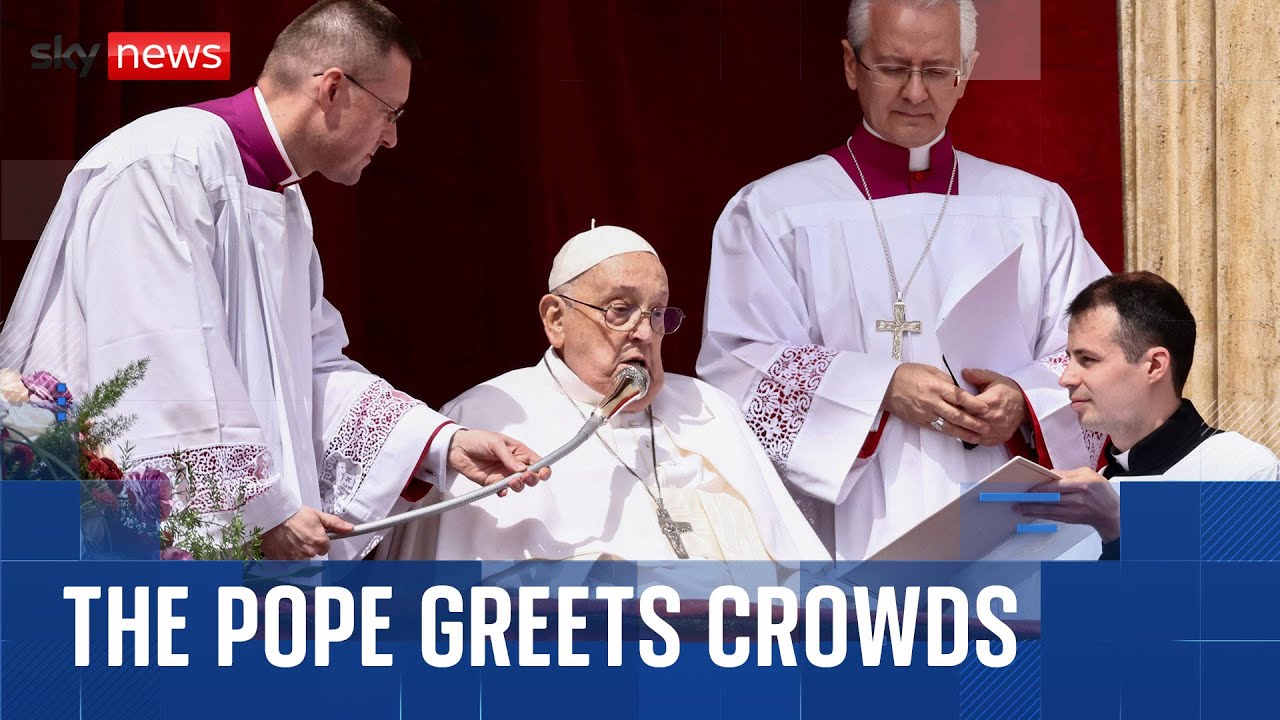 Pope Francis greets crowds at the Vatican