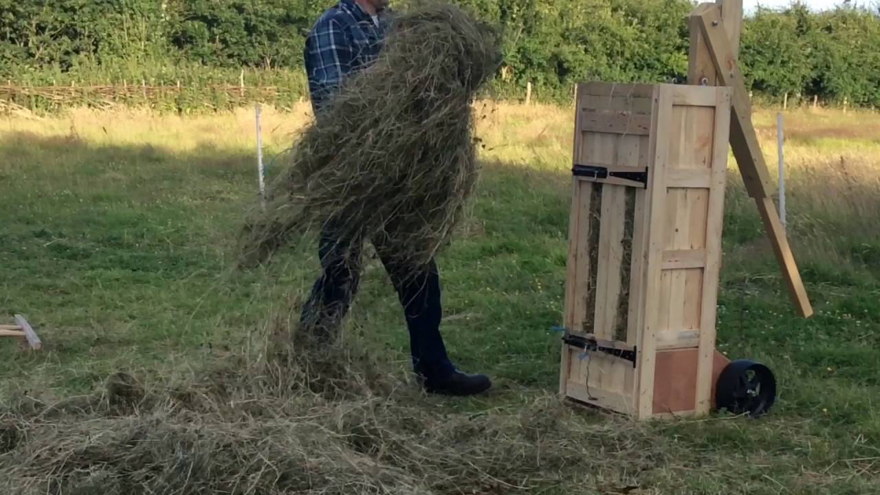 Making hand-made hay bales with a box baler