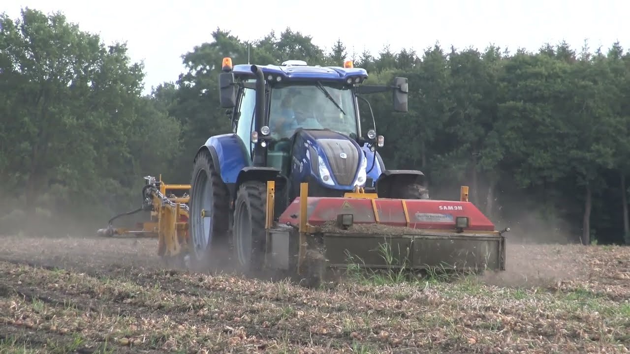 UIEN ROOIEN MET EEN NEW HOLLAND T 6.180 SAMON UIEN ROOIER