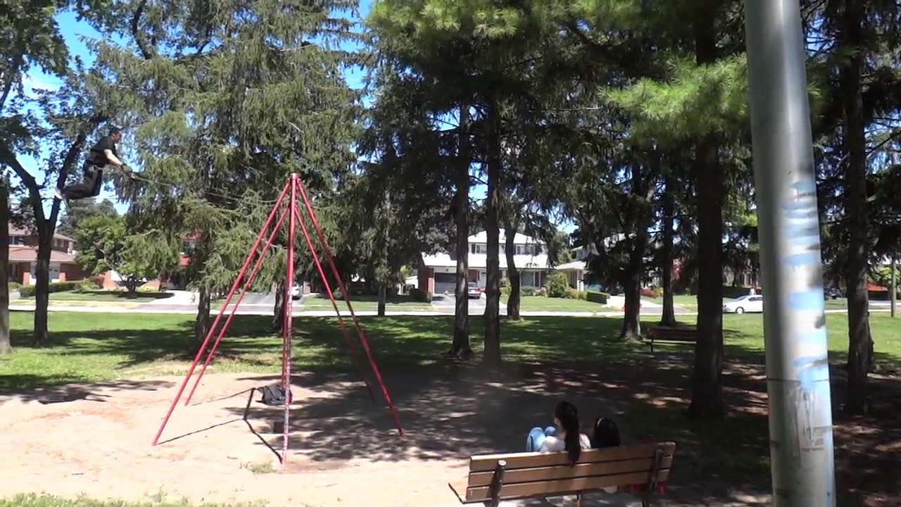 Jeremy on a 13 foot tall swing set July 2013