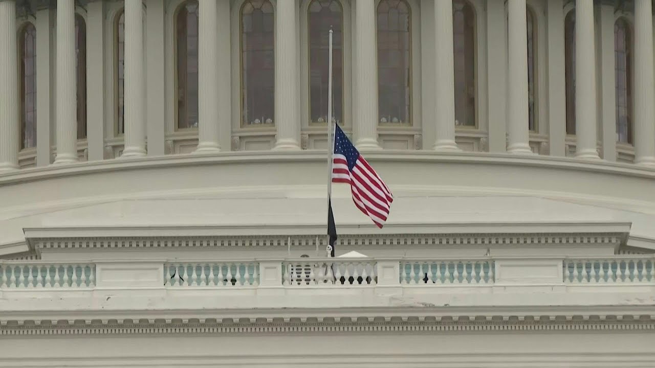 US flag lowered on Capitol after officer dies following clash with pro-Trump mob | AFP