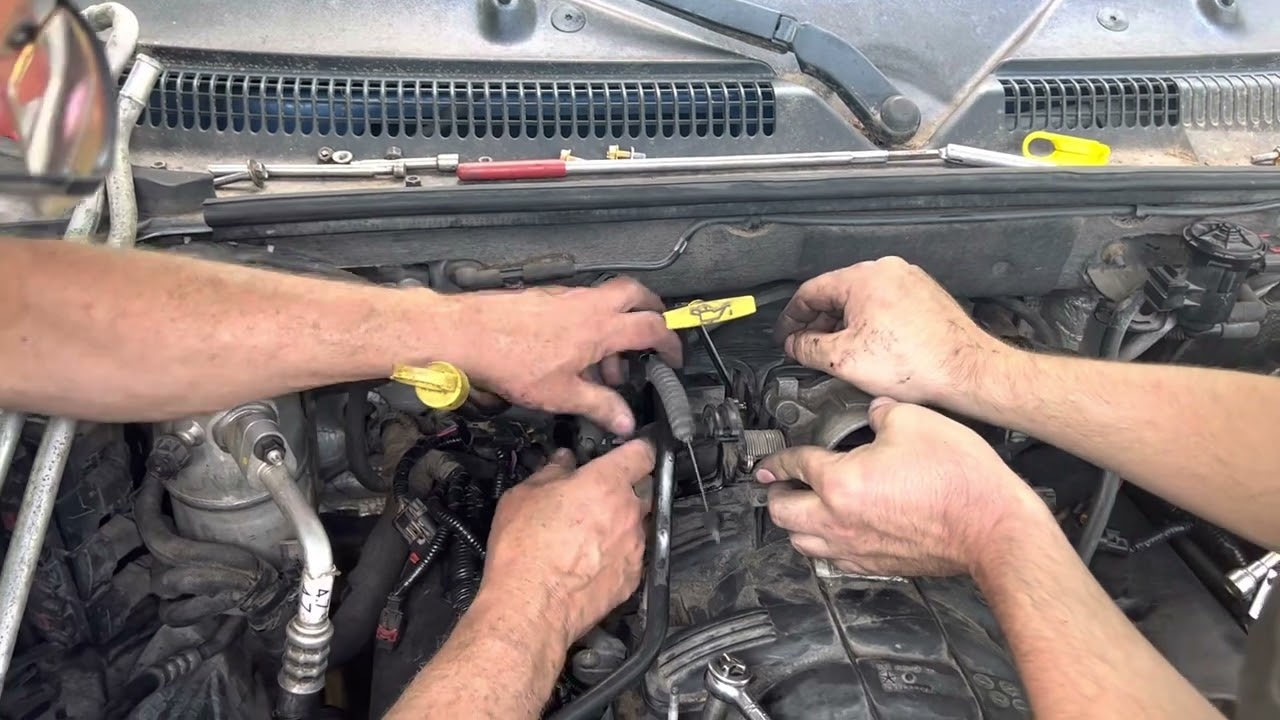 2005 dodge Dakota, Laramie SLT location of the PCV connection in rear of intake manifold