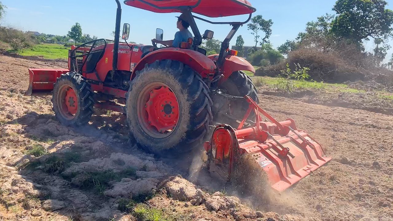 ត្រាក់ទ័រគូបូតាវ៉ៃអង្គប់,Tractor Kubota M6040 SU Plow Field ,Tractor Khmer Farmer