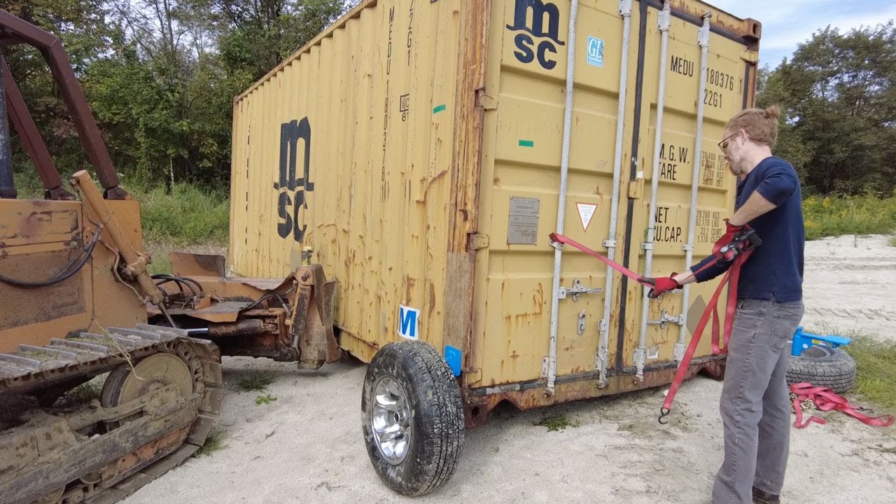 Using Container Wheels and a Bulldozer to Move Four 20ft. Shipping Containers