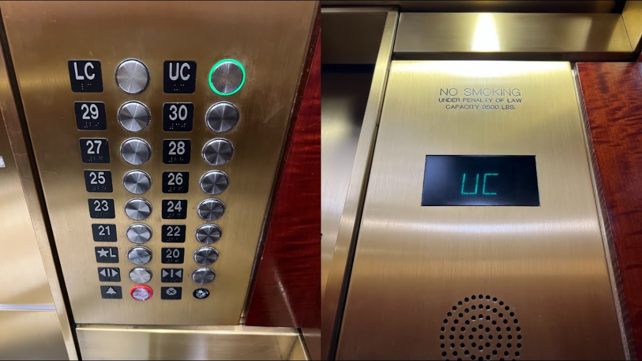 Almost Fully Original 1000 FPM Otis Traction High Rise Elevators at 121 W Trade St in Charlotte NC