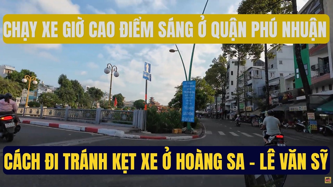 CHẠY XE GIỜ CAO ĐIỂM SÁG Ở PHÚ NHUẬN VÀ CÁCH ĐI TRÁNH KẸT XE Ở NGAY HOÀNG SA LÊ VĂN SỸ.