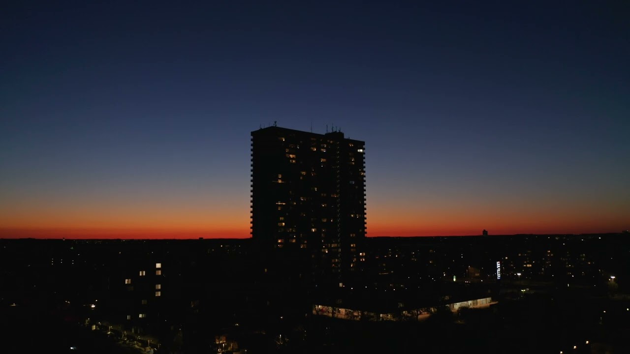 Building in the city at sunset aerial | Free Stock Video Footage 4K [ No Copyright ]