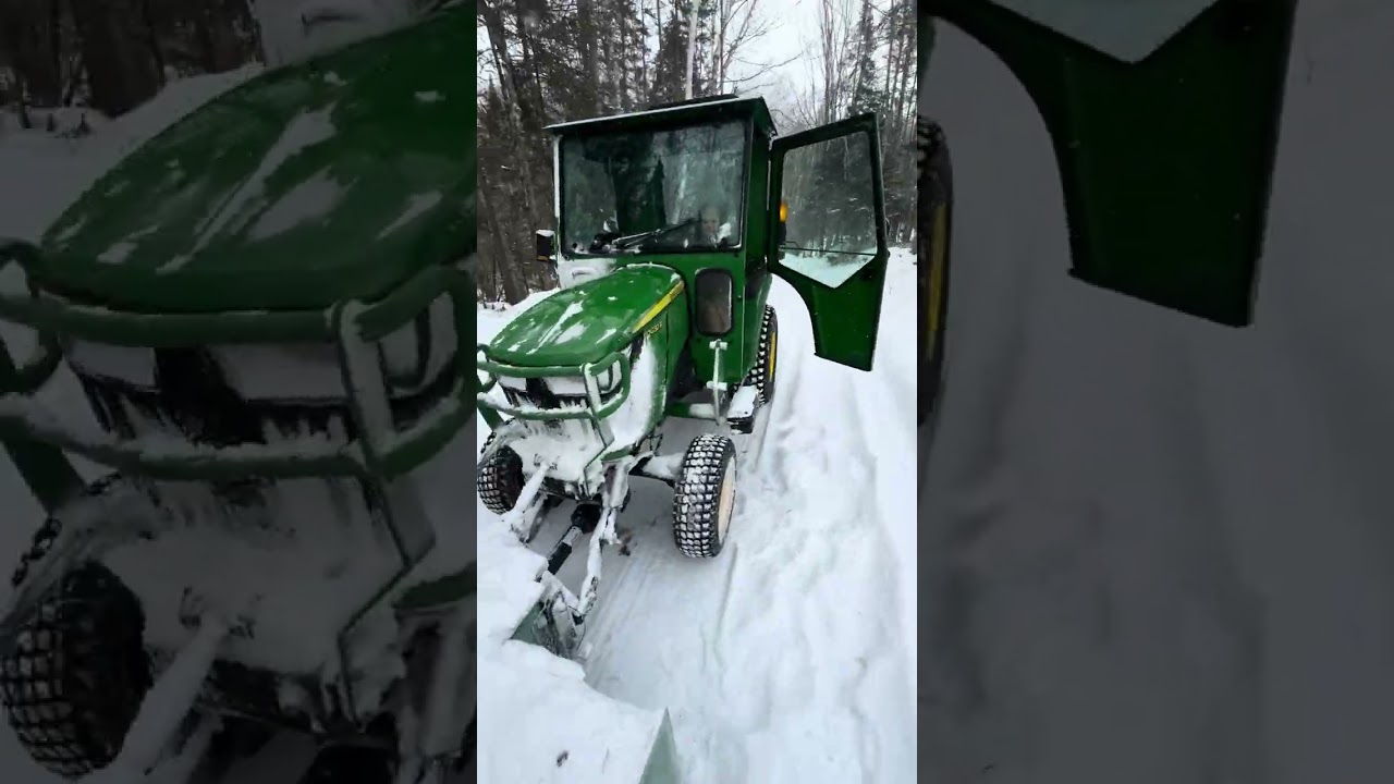 2032R Deere blowing snow!