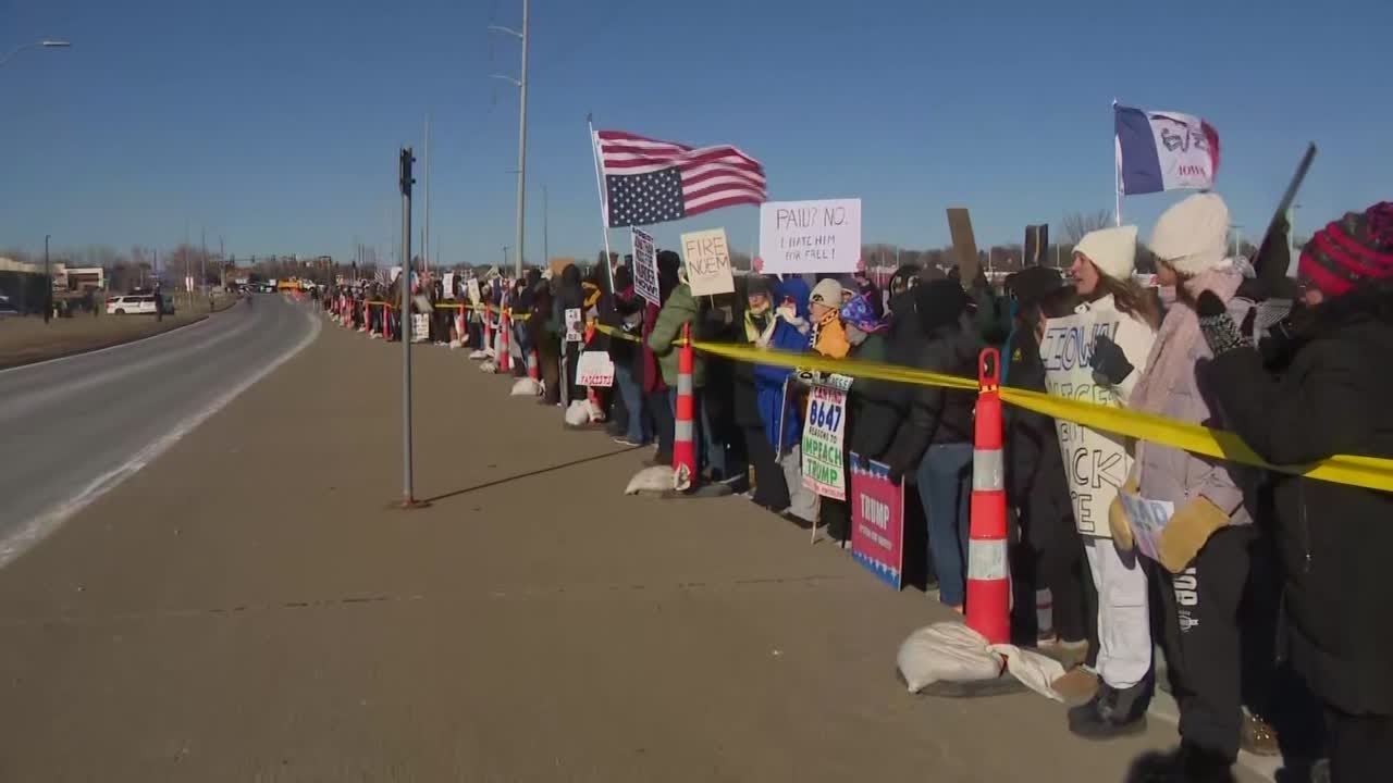 Protesters gather outside Trump event in Iowa