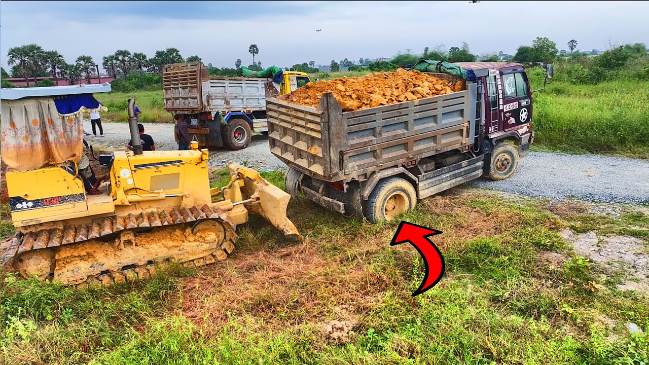 Incredible! Dump Truck stuck, Recovery By Bulldozer KOMATSU D31P, Dump Truck unloading