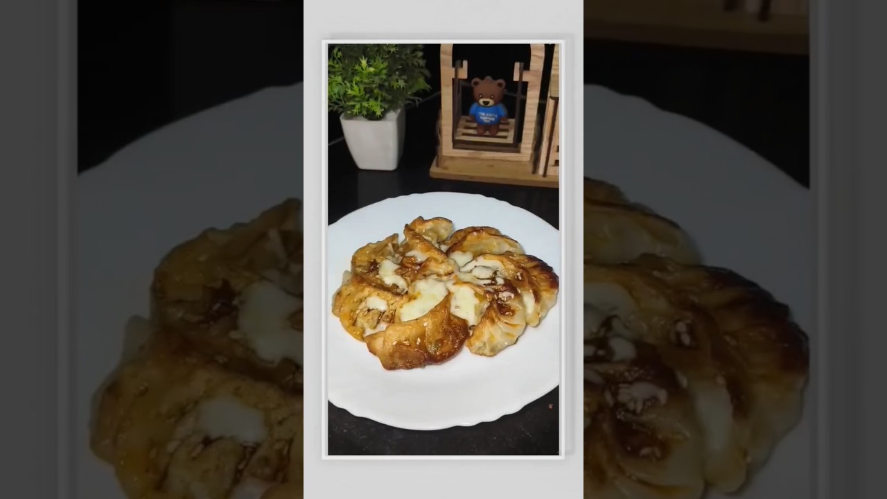 Chilli Oil Cheese Momo 🥟✨ #cheesy #momos #chillioil #chickenmomos #spicy #dumplings