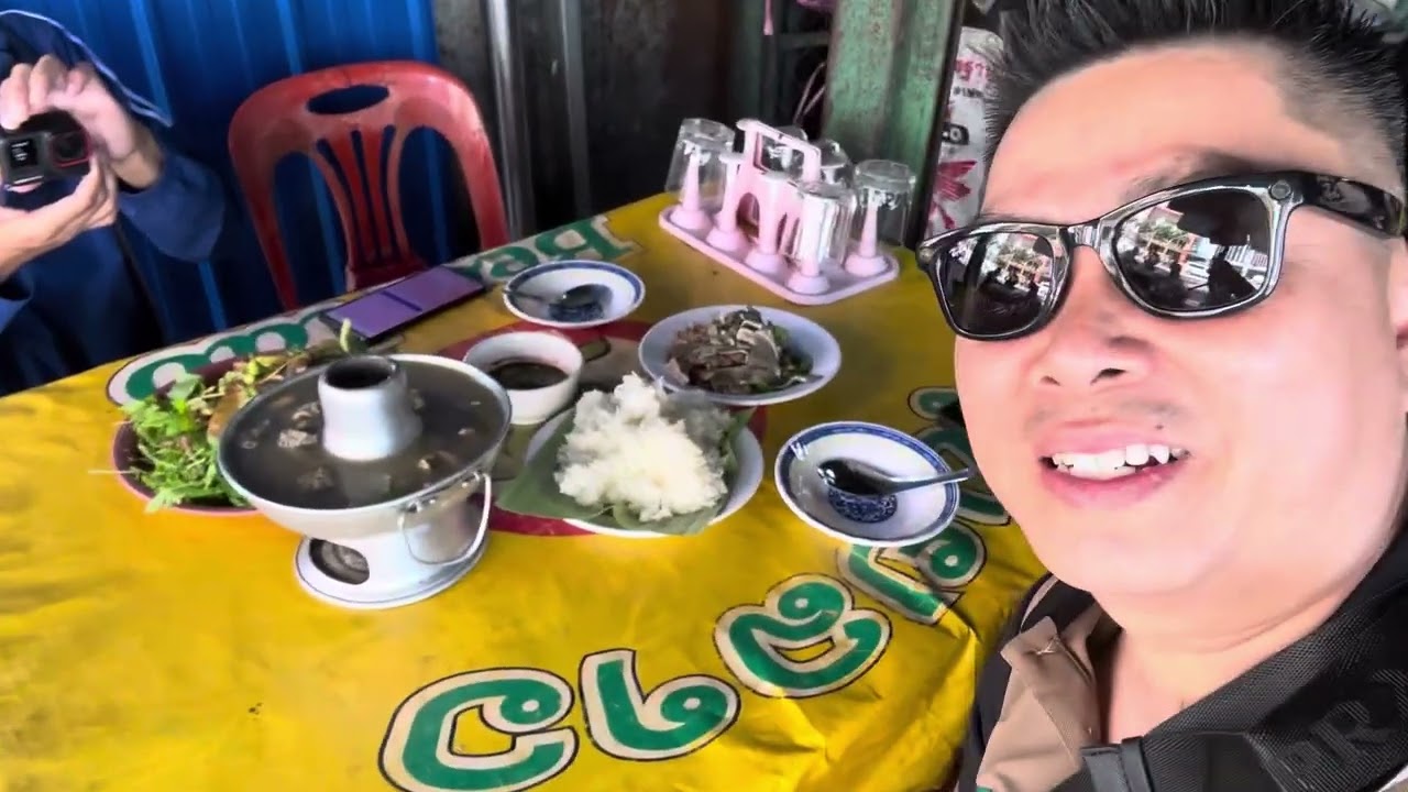 Eating Beef Laap and Soup with BBQ Beef