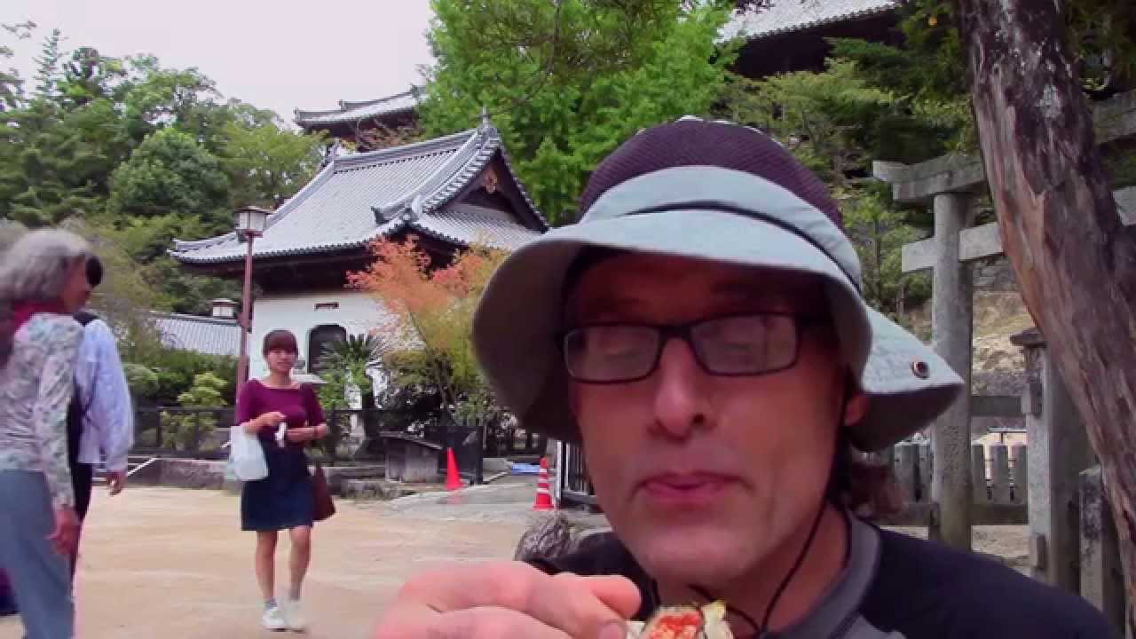 Eating Oyster in slowmo, Near Itsukushima Shrine