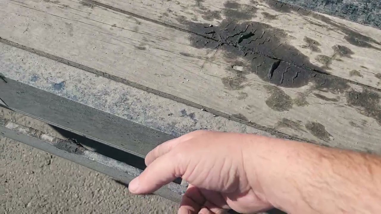 Strapping a vehicle to your hot shot flatbed.