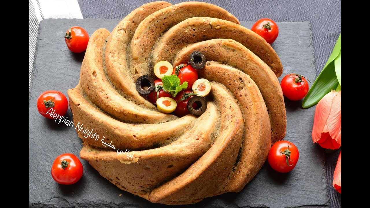 كيكة مالحة  بدون بيض بالزعتر الحلبي والزيتون والحبنة  شي غرام  مع كاسة شاي  جربوها  ومارح تندموا