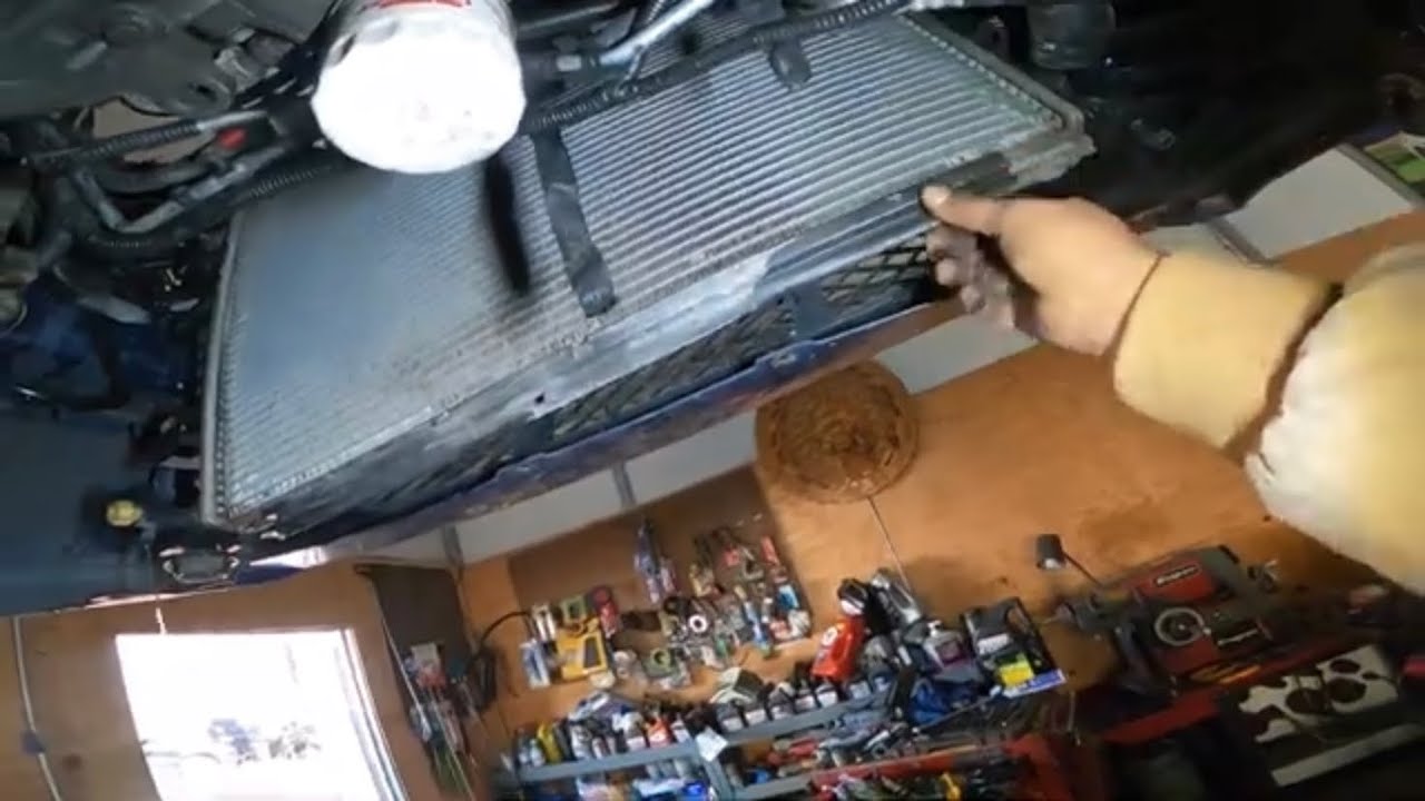 04 Ford Focus como remplazar el radiador