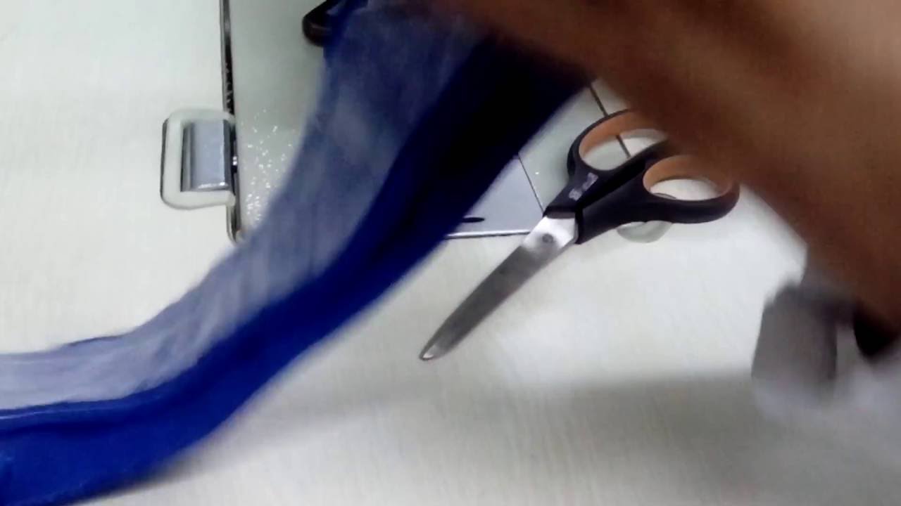 Confección del cuello camisero y pegarlo a la camisa.