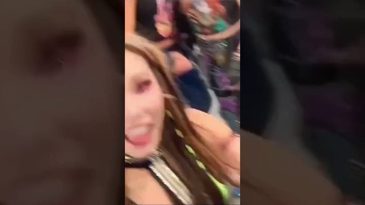 Bayley stops Kairi Sane from taking a picture with a fan!