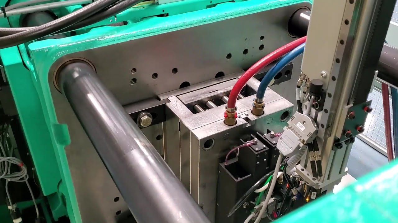 3D printed end of arm tool on Arburg Multilift robot.